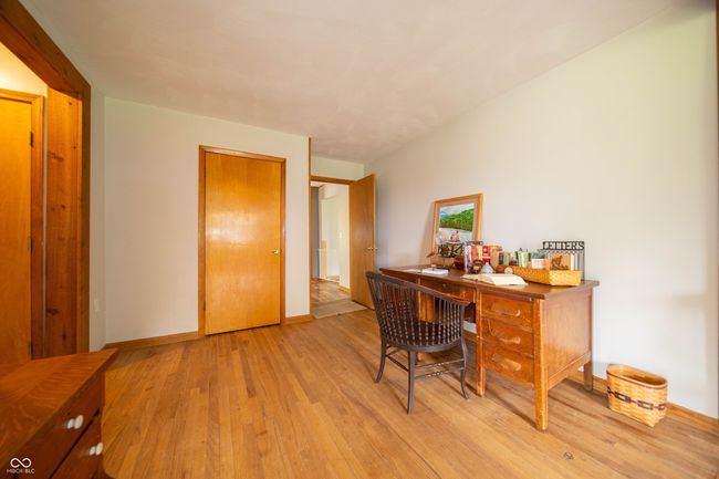 office with light wood finished floors and baseboards | Image 24
