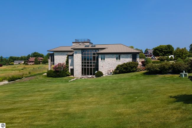 4173 Dornoch Ct, House other with 6 bedrooms, 4 bathrooms and null parking in Williamsburg MI | Image 64