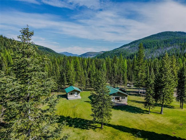 View of mountain background featuring a forest | Image 58