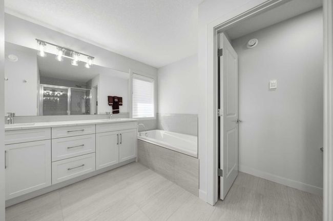 44 Emberside Green, House other with 3 bedrooms, 3 bathrooms and 4 parking in Cochrane AB | Image 35