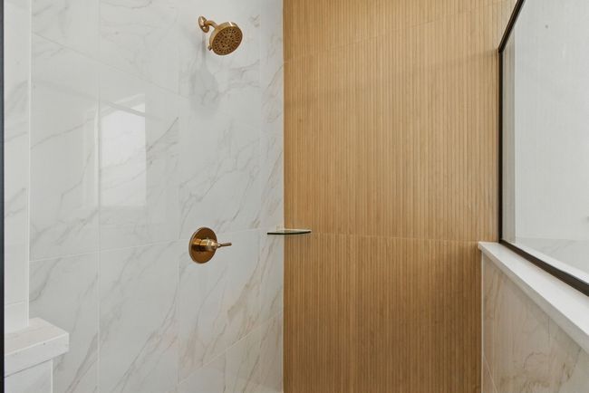 Full bathroom featuring a tile shower | Image 16