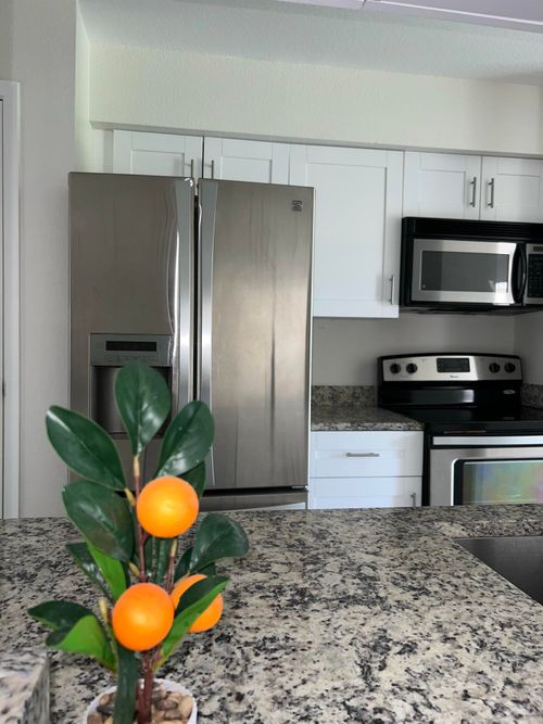 620-899 Riverside Dr, Coral Springs, FL, 33071-7051 | Card Image