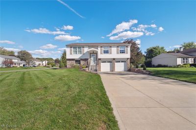 Front of 4497 Honeysuckle with double wide concrete drive. | Image 1