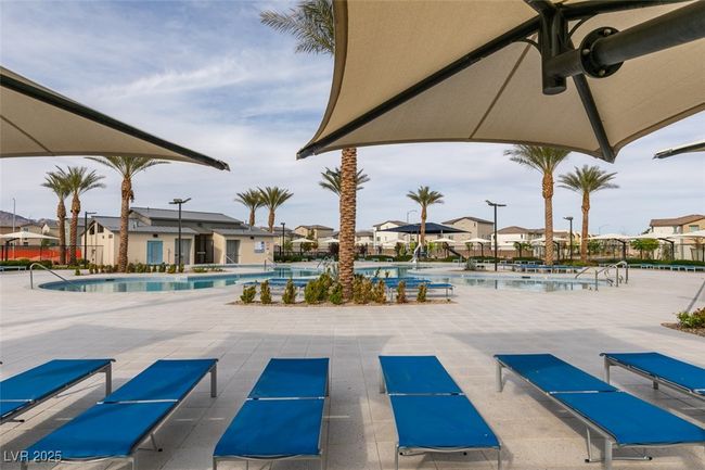 Pool with a residential view and a patio | Image 5