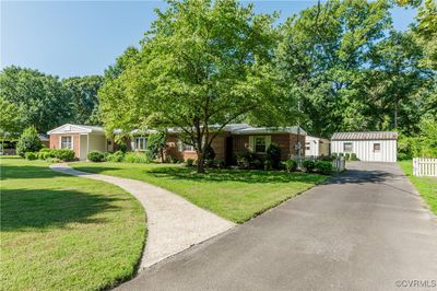 Ranch-style home with a front yard | Image 3