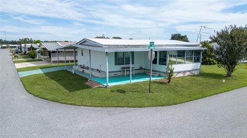 5240 Astrid Dr, ZEPHYRHILLS, FL, 33541-8242 | Card Image