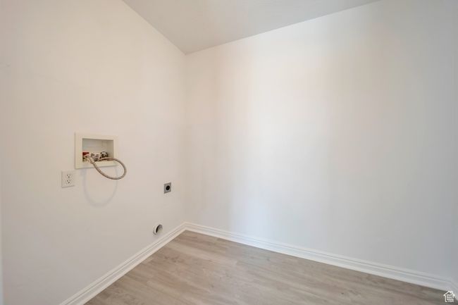 Laundry room with hookup for a washing machine, electric dryer hookup | Image 22