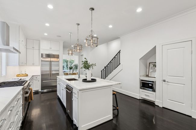 Subzero Wolf Gas Range Kitchen. Calcutta Marble, Custom Cabinetry. | Image 8