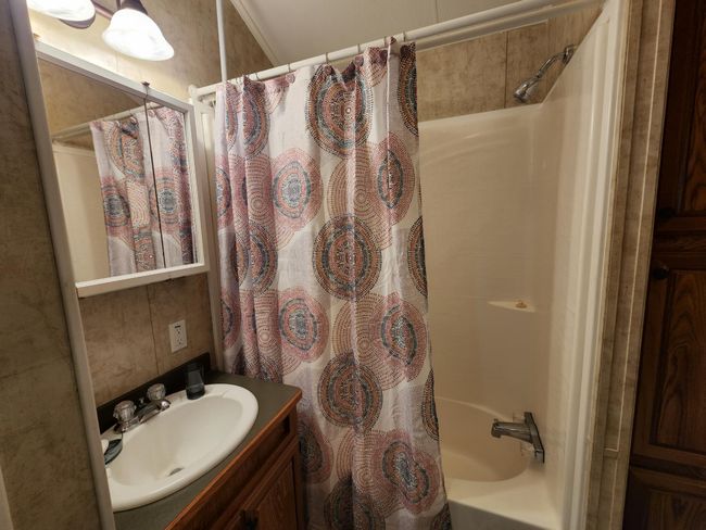 Bathroom with tub and shower | Image 20
