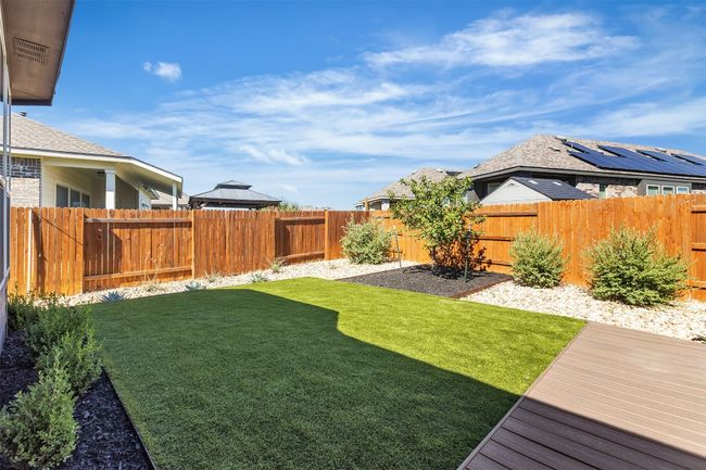 View of fenced backyard | Image 20