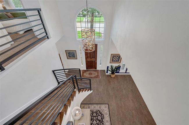 Lovely view from second story, overlooking beautiful, updated chandelier and a dramatic front entry. | Image 29
