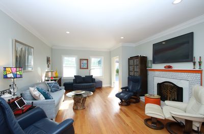 Living room looking from kitchen toward front entry | Image 3