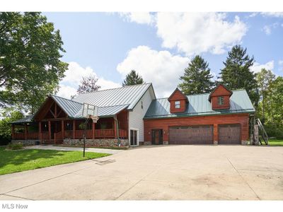 The metal roof gives this house such character | Image 3