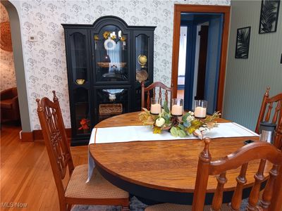 Dining space featuring hardwood / wood-style flooring | Image 3