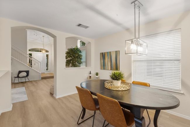 Large space for an oversized dining table and even a bar cart for your evening cocktails | Image 9