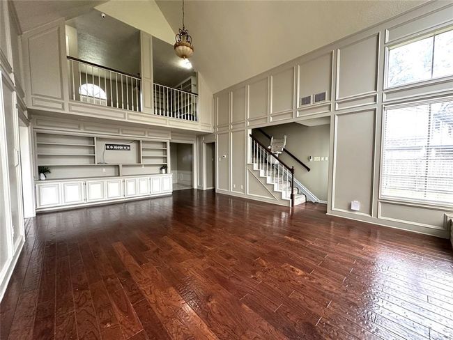 The smooth, polished surface reflects the soft glow of the room’s natural light, making the space feel even more inviting. | Image 6