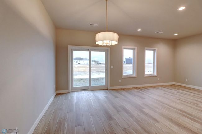 Dinind Area and Patio Access | Image 17
