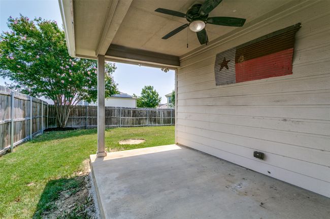 The covered patio is a great way to get out of the sun during those hot summer days. | Image 32