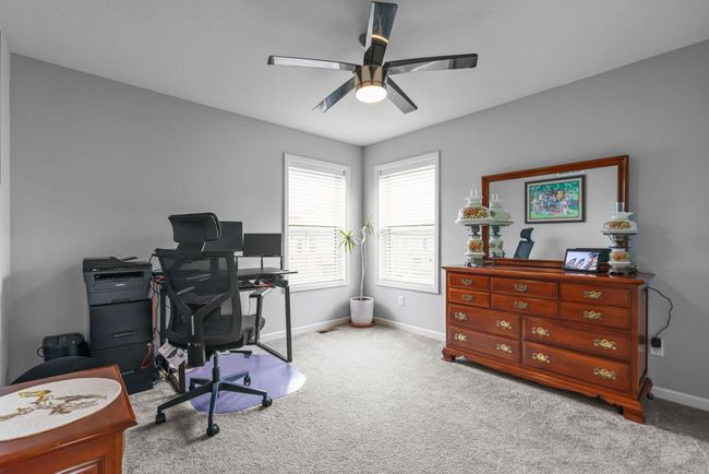 Bedroom 3 features double corner windows and a full closet. | Image 30