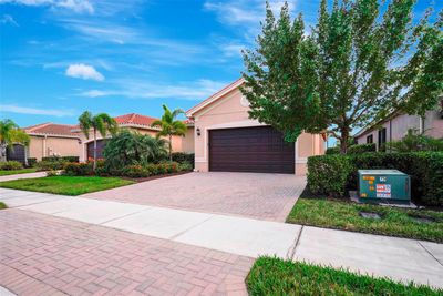 View of front of property with a garage | Image 2