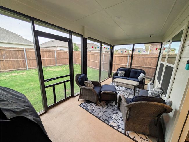 Sunroom / solarium featuring outdoor lounge area | Image 9