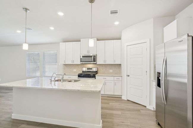 Photo is not of the actual home but is an inspirational photo of builder’s model home and may depict options, furnishings, and/or decorator features that are not included. | Image 5