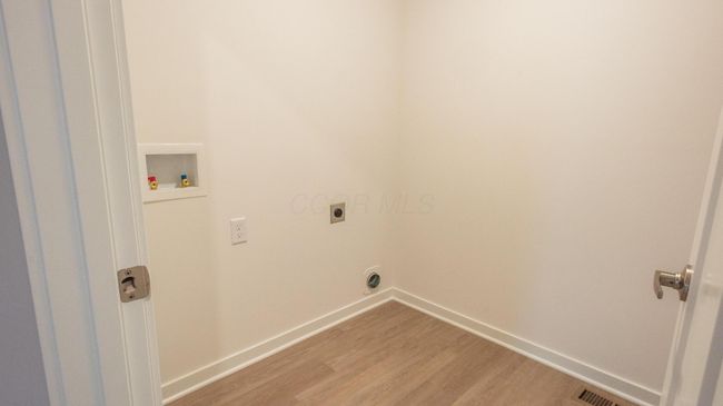 Upstairs laundry room with storage | Image 16
