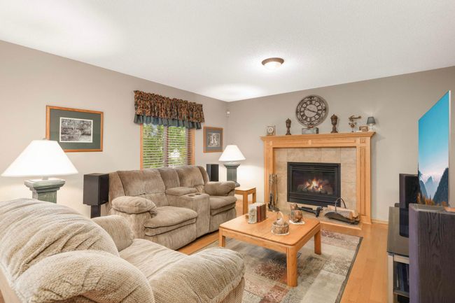 Living room with gas fireplace. | Image 5