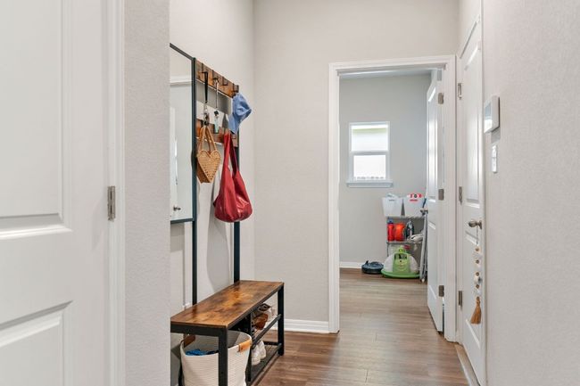 Mudroom at garage entry and adjacent to laundry room. | Image 17
