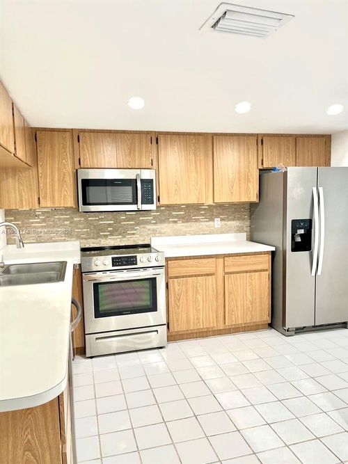 1005-1005 Palm Beach Trace Dr, Royal Palm Beach, FL, 33411-1269 | Card Image