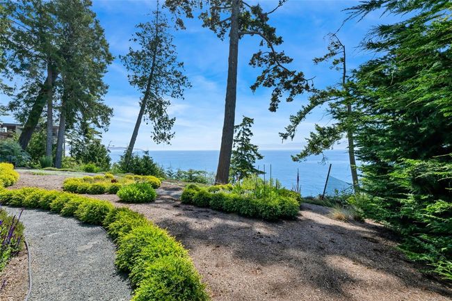 View of yard featuring a water view | Image 21