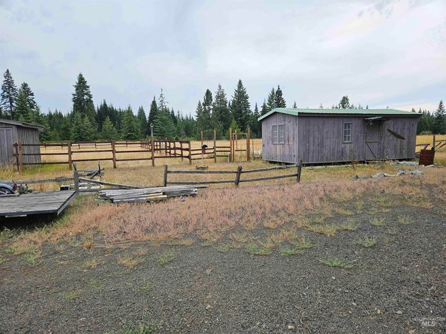 View of yard featuring a storage shed and a view of rural / pastoral area | Image 32