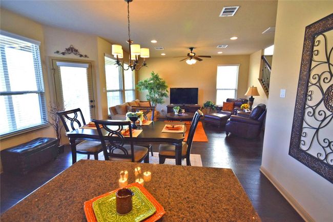 kitchen open to dining area and family room | Image 7