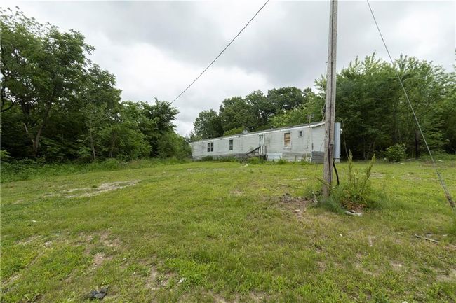 view of house from drive | Image 6