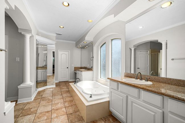 Luxuriously designed Primary Bathroom with Spa like Hot Tub | Image 19