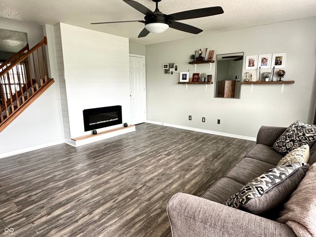 Updated Family Room with Built in Fireplace | Image 9