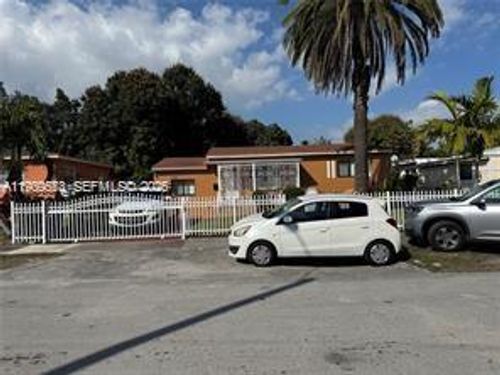 1077 Ne 157th Ter, North Miami Beach, FL, 33162-5335 | Card Image