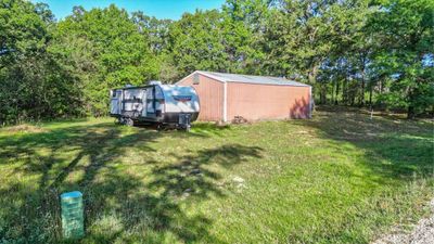 View of yard featuring a storage shed | Image 2