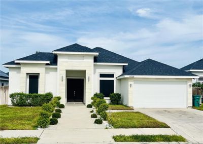 View of front of house with a garage | Image 1