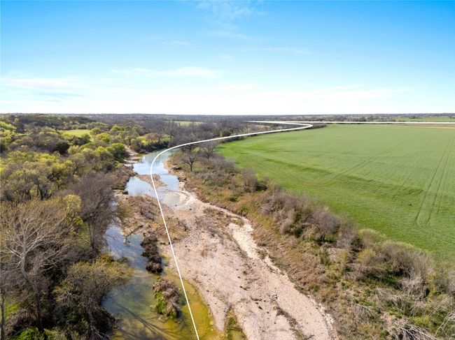 Birds eye view of property featuring a rural view and a water view | Image 17