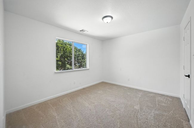 Empty room featuring carpet floors and baseboards | Image 18