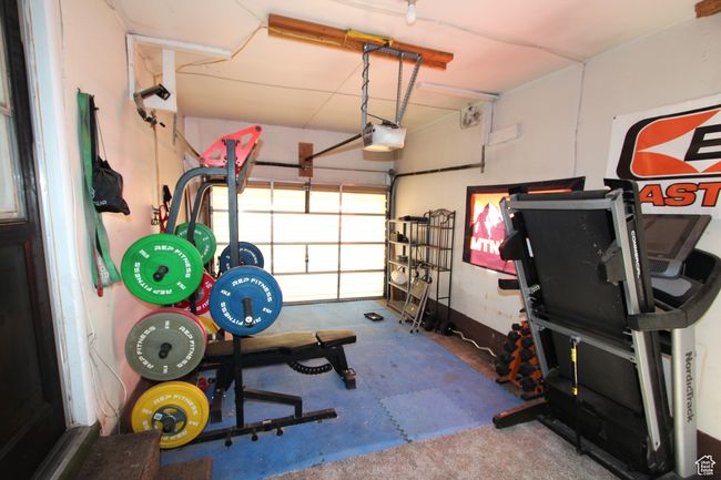 Workout area with a garage | Image 30