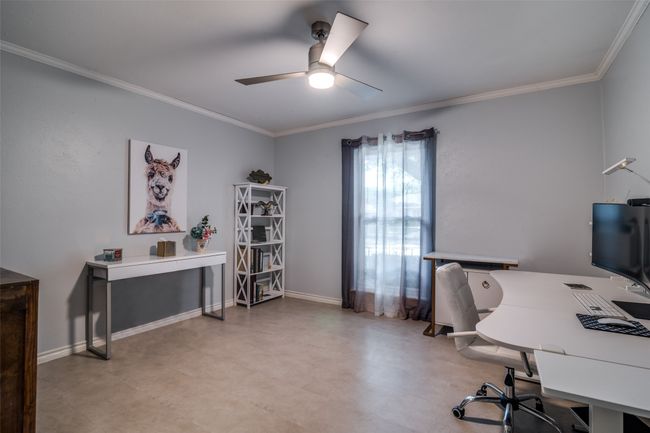 Bedroom Office featuring a ceiling fan, crown molding, and baseboards | Image 14