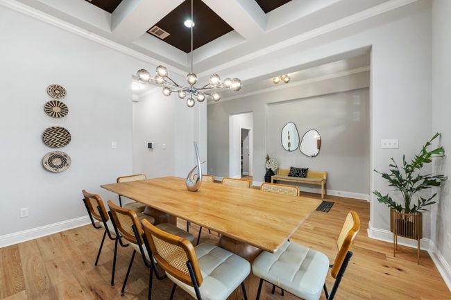 The spacious dining room flows into the kitchen making it a breeze to host everything from daily dinner to holidays and can seat up to ten. | Image 9