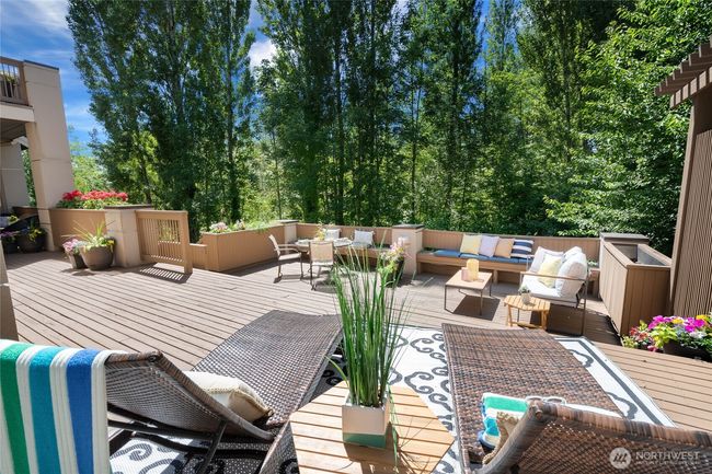 Off the Main Floor Primary Suite - Luxurious Deck | Image 36