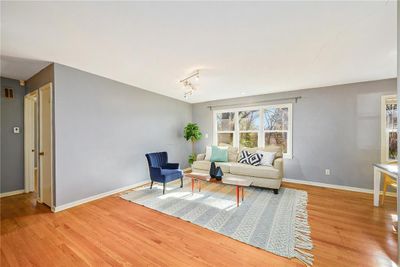 Living room featuring hardwood / wood-style floors | Image 2