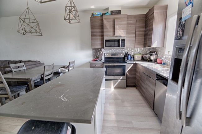 841 Greywolf Run N, Home with 3 bedrooms, 2 bathrooms and 2 parking in Lethbridge AB | Image 5