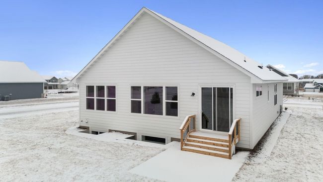 Just off the dining room, the backyard patio provides the perfect extension of living space, ideal for outdoor dining, relaxing, or entertaining. The patio itself offers a peaceful setting to enjoy meals al fresco or unwind after a busy day. | Image 39