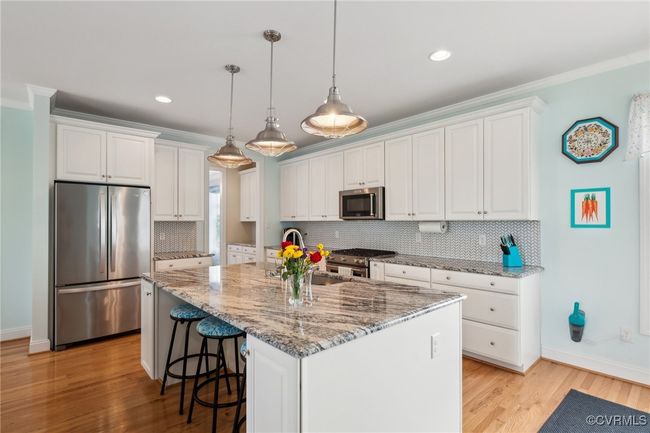 Kitchen was thoughtfully designed offering many slide out drawers instead of the standard cabinetry. | Image 8