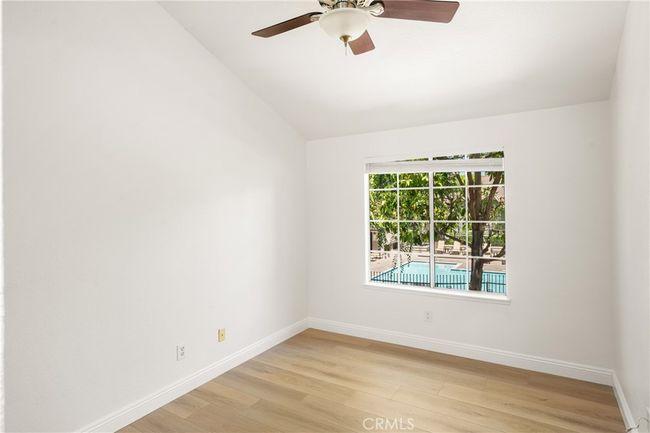Secondary suite on upper level with pool view | Image 32